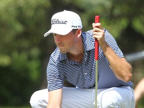 Brett Hogan of Calgary, Alta hits on the 18th green during the Glencoe Invitational in Calgary, Alta on Saturday June 6, 2015.