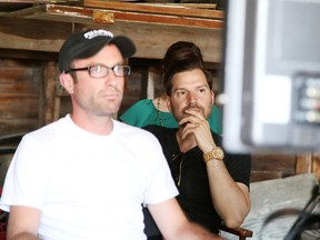 Behind the scenes on the set of Letterkenny, producers Jacob Tierney and Mark Montefiore watch as a scene is filmed in Sudbury. Gino Donato/Sudbury Star/Postmedia Network