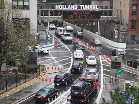 Vehicles enter the Holland Tunnel in New York City in this Nov. 26, 2014 file photo. (Preston Rescigno/Getty Images)