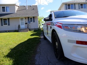 A Military Police cruiser is shown here, Wednesday, June 22, 2016, parked outside of a home at CFB Trenton where a woman was found dead Tuesday, June 21, 2016. 

Emily Mountney-Lessard/Belleville Intelligencer/Postmedia Network