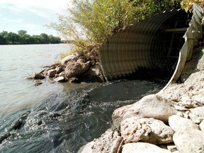 Sewage spills into the Red River.