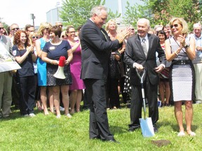 Front and centre for the official ground-breaking for the Nova Chemicals Health and Research Centre, and an Athletics and Fitness Complex, are from left, college board chairperson Sandy Marshall, college foundation chairperson Andy Brandt and college president Judith Morris on Wednesday June 22, 2016 at the college in Sarnia, Ont. (Paul Morden/Sarnia Observer)