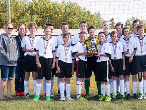 Vermilion's U14 Boys soccer team celebrates their Lakeland Cup victory, following the two-day tournament, with a straight win streak, this past weekend. Taylor Hermiston/Vermilion Standard/Postmedia Network.