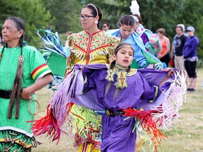 Dancers take part in the Grand Entry at the N'Swakamok Native Friendship Centre National Aboriginal Day celebration in Bell Park in Sudbury, Ont. on Tuesday June 21, 2016. Gino Donato/Sudbury Star/Postmedia Network