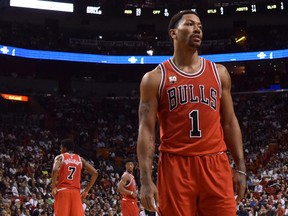 Chicago Bulls guard Derrick Rose looks on during the second half against the Miami Heat at American Airlines Arena. (Steve Mitchell-USA TODAY Sports)