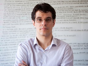 Writer Steven Galloway is pictured in his office at the University of British Columbia in Vancouver, British Columbia on March 31, 2014. (BEN NELMS for National Post)
