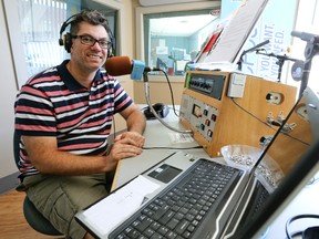 Manny Paiva, a long serving radio host and the news manager at Bayshore Broadcasting in the Dave Carr studio at the station on Wednesday in Owen Sound. Paiva announced on air Wednesday he will be leaving the station for a job as the news director at CTV Windsor.  James Masters/The Owen Sound Sun Times/Postmedia Network