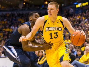 Marquette Golden Eagles forward Henry Ellenson drives for the basket during the first half against the Villanova Wildcats at BMO Harris Bradley Center in Milwaukee on Feb. 27, 2016. (Jeff Hanisch/USA TODAY Sports)