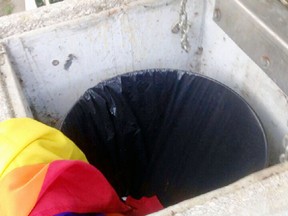 The rainbow flag Ingersoll raised in Dewan Park for Pride was taken down and thrown in the trash Monday afternoon. Police are searching for a suspect in the incident that was witnessed by at least one person. (SUBMITTED PHOTO)