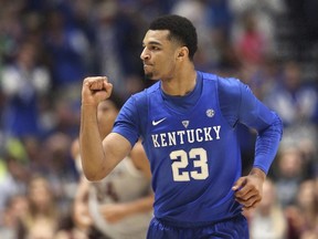 Kentucky's Jamal Murray celebrates after a basket against Texas A&M during the first half of an NCAA college basketball game in the championship of the Southeastern Conference tournament in Nashville, Tenn., March 13, 2016. (THE CANADIAN PRESS/ AP/John Bazemore)
