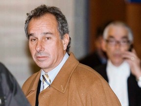 Cinar co-founder Ronald Weinberg arrives at the courthouse in Montreal, Monday, Dec. 11, 2006. The co-founder of the Cinar animation company was handed a nine-year sentence for fraud. THE CANADIAN PRESS/Paul Chiasson