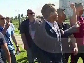 Cristiano Ronaldo throws reporter's mic into a lake. (BBC video screen grab)