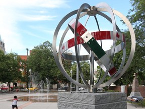 A statue sits in a park across the street from St.Anthony's Church on Booth Street