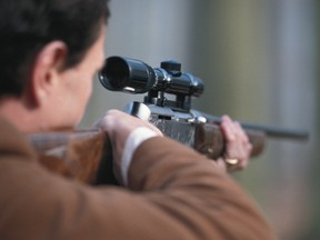 Rifle with scope - Getty