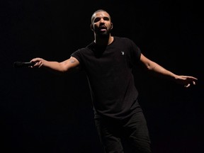 Drake performs on the main stage at Wireless festival in Finsbury Park, London, Sunday, June 27, 2015. THE CANADIAN PRESS/AP-Photo by Jonathan Short/Invision/AP