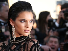 FILE - In this May 15, 2016, file photo, Kendall Jenner poses for photographers upon arrival at the screening of the film Mal De Pierres at the Cannes International Film Festival in southern France. Fashion designer shared a photo on Facebook June 22, 2016, of an advertisement featuring Jenner made up as what Jacobs calls a "goth goddess." (AP Photo/Joel Ryan, File)