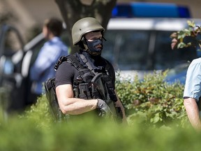 Heavily-armed police stand outside the movie theatre Kinopolis where an armed man has reportedly opened fire on June 23, 2016 in Viernheim, Germany. (Photo by Alexander Scheuber/Getty Images)