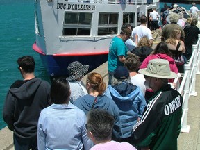 Passengers line up to board the Duc d'Orleans in this file photo. More than 1,000 seniors and their companions are expected to participate in the 38th annual seniors cruise set for this Monday. (Handout)