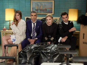 Annie Murphy as Alexis Rose, left to right, Eugene Levy as Johnny Rose, Catherine O'Hara as Moira Rose and Dan Levy as David Rose in CBC's comedy Schitt's Creek pose in an undated handout photo.