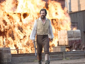 This image released by STX Productions shows Matthew McConaughey in a scene from "The Free State of Jones." (Murray Close/STX Productions)