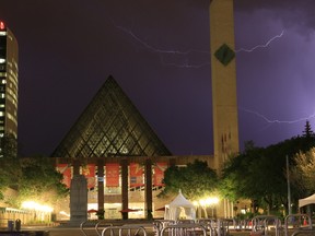 Lightning is visible at Edmonton City Hall on Aug 9, 2015 in Edmonton, Alberta. Edmonton Sun reader Photo Hugo Sanchez/Postmedia Network