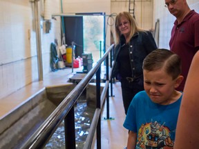 Jason Mayhew, 8, reacts to the strong smell in the Whitecourt Wastewater Treatment Plan during a public tour on June 14. The town has opened up the odour issue to public input in order to find a possible long term solution. Hannah Lawson | Whitecourt Star