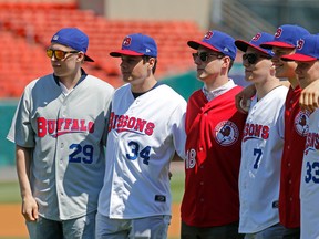 NHL top prospects (L-R) Patrick Laine, Auston Matthews. Pierre-Luc Dubois, Matthew Tkachuk Jesse Puljujarvi and Olli Juolevi had a chance to try some baseball skills at the Buffalo Bisons' park before a minor league game in Buffalo on June 22, 2016. Michael Peake/Toronto Sun/Postmedia Network