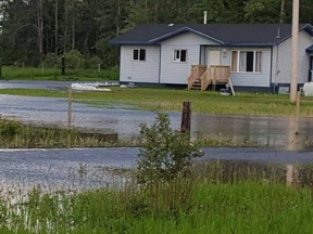 A local state of emergency was declared Monday after flooding forced more than 100 people from their homes on Dene Tha' First Nation in northern Alberta. Supplied