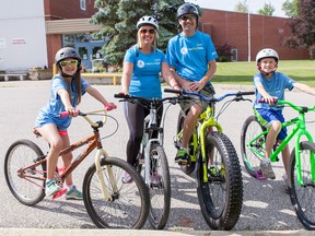 Sarah Hachey and her family biked in last year's Ride Don't Hide - Lambton Kent fundraiser for the local branch of the Canadian Mental Health Association. Pictured with Hachey at the 2015 event are husband Marc, son Logan, 12, and daughter Makayla, 10. This year's ride is Sunday, starting in Mooretown. (Handout)