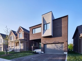 With its flat roof and airy, open design, the active house stands out from other homes in the Etobicoke, Ont. neighbourhood.