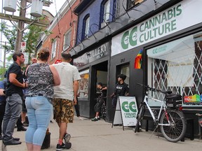Cops raid Cannabis Culture on Queen St. W. on Thursday, June 23, 2016 (Nick Westoll/Toronto Sun)