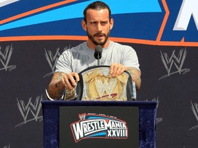 Phil Brooks, who went by CM Punk when he wrestled in the WWE, will make his UFC debut in September. (Postmedia Network file photo)