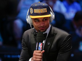 Jamal Murray answers questions during an interview after being selected seventh overall by the Denver Nuggets during the NBA draft in New York on June 23, 2016. (AP Photo/Frank Franklin II)