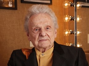This March 11, 2011, file photo shows Ralph Stanley backstage at the Grand Ole Opry House in Nashville, Tenn. (AP Photo/Ed Rode, File)