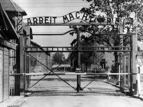 The main gate of the Nazi concentration camp Auschwitz in Poland.  Writing over the gate reads: "Arbeit macht frei" (Work Sets You Free). (AP Photo/File)