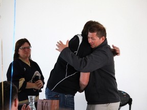 Outgoing head coach Jason McKee says goodbye to team owner Darren Myshak. - Photo supplied