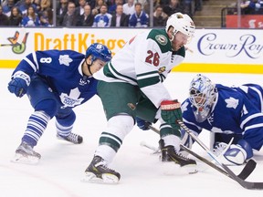Minnesota Wild forward Thomas Vanek (26) tries to get the puck around Toronto Maple Leafs goaltender Garret Sparks as Leafs’ Connor Carrick defends during NHL action in Toronto on Thursday March 3, 2016. (THE CANADIAN PRESS/Chris Young)