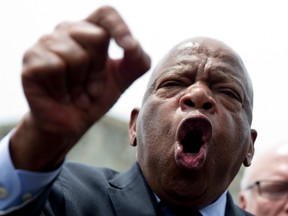 Rep. John Lewis, D-Ga. speaks on Capitol Hill in Washington, Thursday, June 23, 2016, after House Democrats ended their sit in protest on the House floor. (AP Photo/Carolyn Kaster)