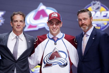 TENTH PICK: TYSON JOST, COLORADO AVALANCHE
Tyson Jost celebrates with the Colorado Avalanche after being selected tenth overall during round one of the 2016 NHL Draft on June 24, 2016 in Buffalo, New York. 
(Bruce Bennett/Getty Images/AFP)