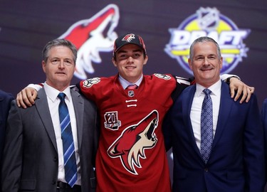 SEVENTH PICK: CLAYTON KELLER, ARIZONA COYOTES
Clayton Keller celebrates with the Arizona Coyotes after being selected seventh overall during round one of the 2016 NHL Draft on June 24, 2016 in Buffalo, New York. 
Bruce Bennett/Getty Images/AFP