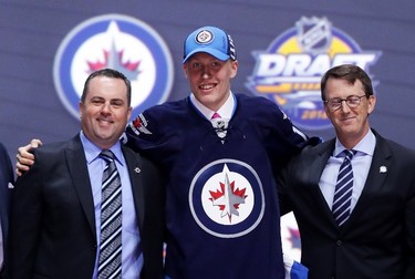 SECOND PICK: PATRIK LAINE, WINNIPEG JETS
Patrik Laine reacts after being selected second overall by the Winnipeg Jets during round one of the 2016 NHL Draft on June 24, 2016 in Buffalo, New York. 
Bruce Bennett/Getty Images/AFP