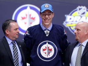 Logan Stanley (centre). (BRUCE BENNETT/Getty-AFP)