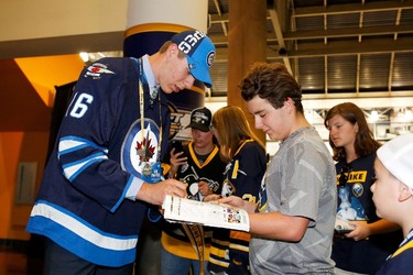 EIGHTEENTH PICK: LOGAN STANLEY, WINNIPEG JETS
Logan Stanley signs autographs after being selected 18th overall during the NHL Draft in Buffalo on June 24, 2016. 
(Jen Fuller/Getty Images/AFP)