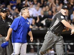 John Gibbons of the Toronto Blue Jays is thrown out of the game against the Chicago White Sox by third base umpire Ted Barrett for arguing a call during the ninth inning on June 24, 2016 at U. S. Cellular Field in Chicago. (David Banks/Getty Images/AFP)