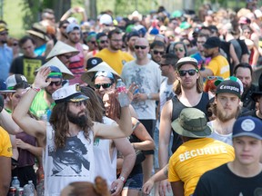 Long lines to get through security as the annual Amnesia Rockfest invades the village of Montebello in Quebec, about an hour away from Ottawa and Montreal. (WAYNE CUDDINGTON) Assignment - 124109