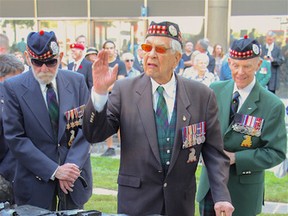 Veteran Herb Pike waves at the Peace Through Valour monument's official unveiling and dedication ceremony on Saturday, June 25, 2016. Nick Westoll/Toronto Sun/Postmedia Network