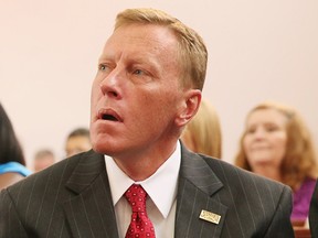 In this file photo, Sanford Mayor Jeff Triplett attends a prayer vigil organized to promote peace and unity in the community in the wake of the George Zimmerman trial at the New Life World Center church on July 15, 2013 in Sanford, Florida. (Photo by Scott Olson/Getty Images)