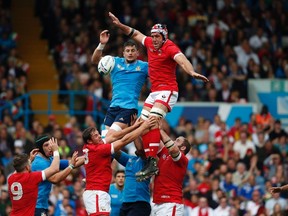 Canada's Jamie Cudmore (top right) wins the ball in a line out during the Rugby World Cup Pool D match between Italy and Canada at last year's World Cup. (AP)