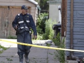 A man died after he was pulled from a fire in the Queen St.-Landsdowne Ave. area. (ERNEST DOROSZUK, Toronto Sun)