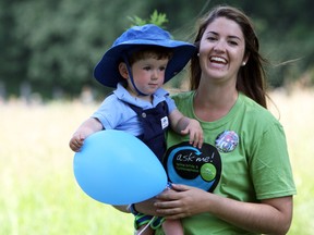 Isaac Heroux and his mom Julia Heroux at Isaac's Walk, the first Spina Bifida & Hydrocephalus Association of Ontario Spirit Wheel Walk Run at Lemoine's Point Conservation Area in Kingston, Ont. on Sunday June 26, 2016. Steph Crosier/The Whig-Standard/Postmedia Network